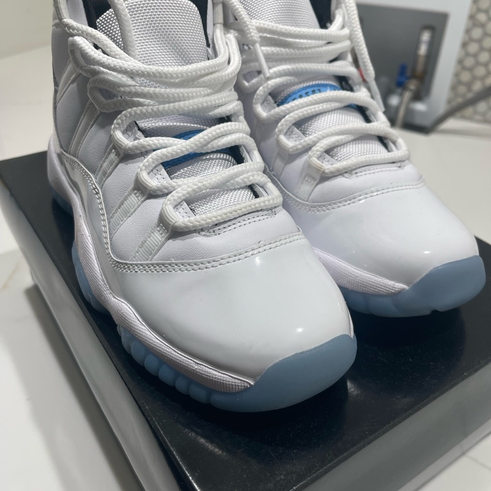 Nike Jordan 11 Retro White and Blue Sneakers
